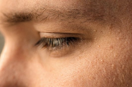 Closeup of a man's face with skin texture visible