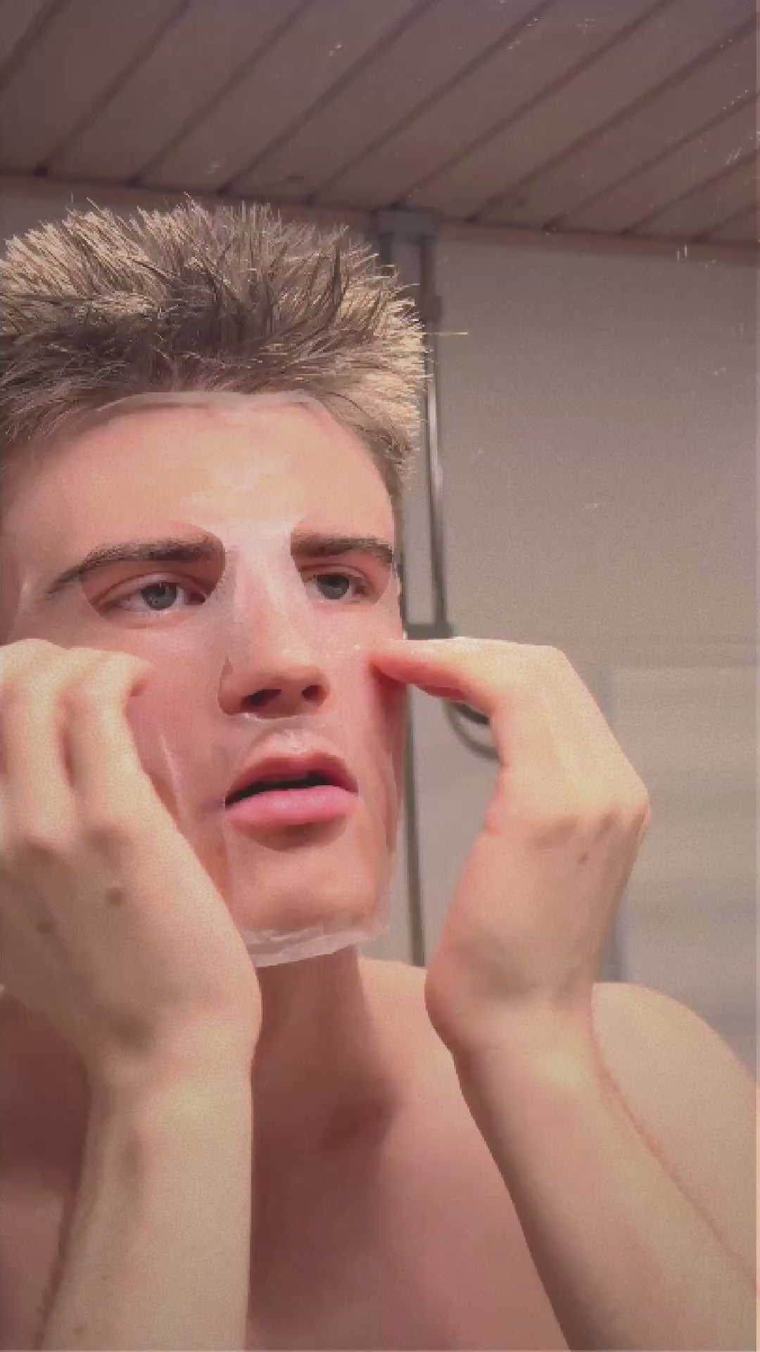 Man opening The Prepared Guy sheet mask sachet and applying the sheet mask on his face with the skin looking fresh after mask use.